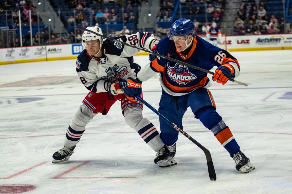 Brandon Scanlin of the Hartford Wolf Pack and Eetu Liukas of the Bridgeport Islanders, 11/24/24.