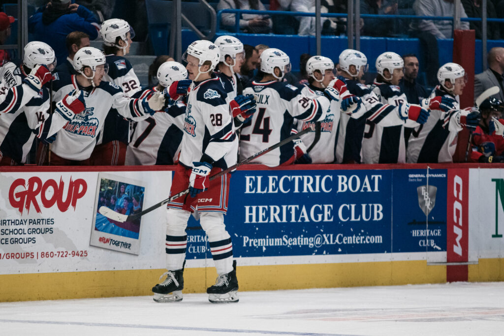 Dylan Roobroeck celebrates a goal with the Hartford Wolf Pack.