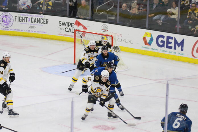 Frederic Brunet, Ryan Mast, and goaltender Michael DiPietro for the Providence Bruins defend the goal from the Cleveland Monsters' Justin Pearson, Hunter McKown, and Madison Bowey on November 17, 2024 at Amica Mutual Pavillion in Providence, RI. Photo credit: Brian Stone Sr for The Calder Times